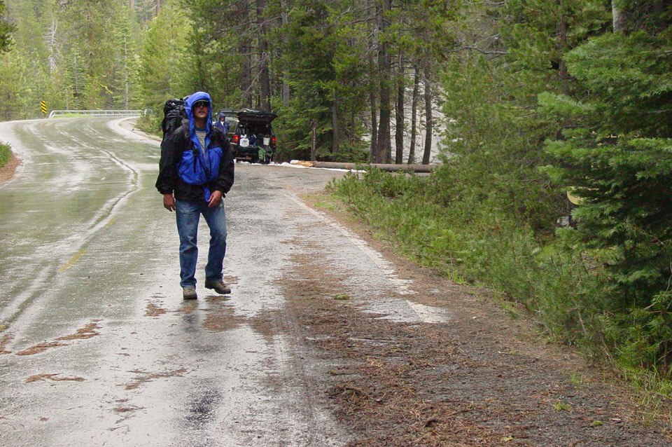 John starts the hike to the Island in the rain, 2005