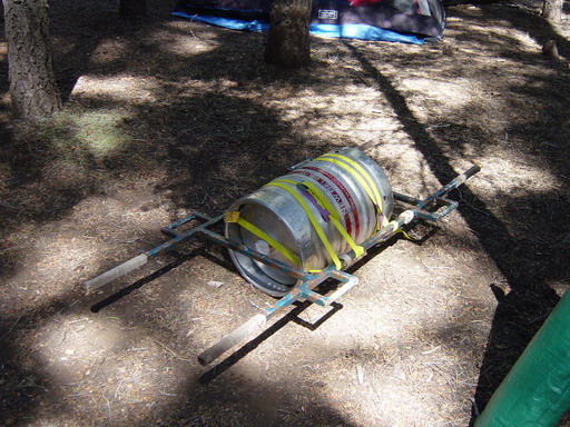 The steel stretcher with keg strapped in, resting at camp, 2006