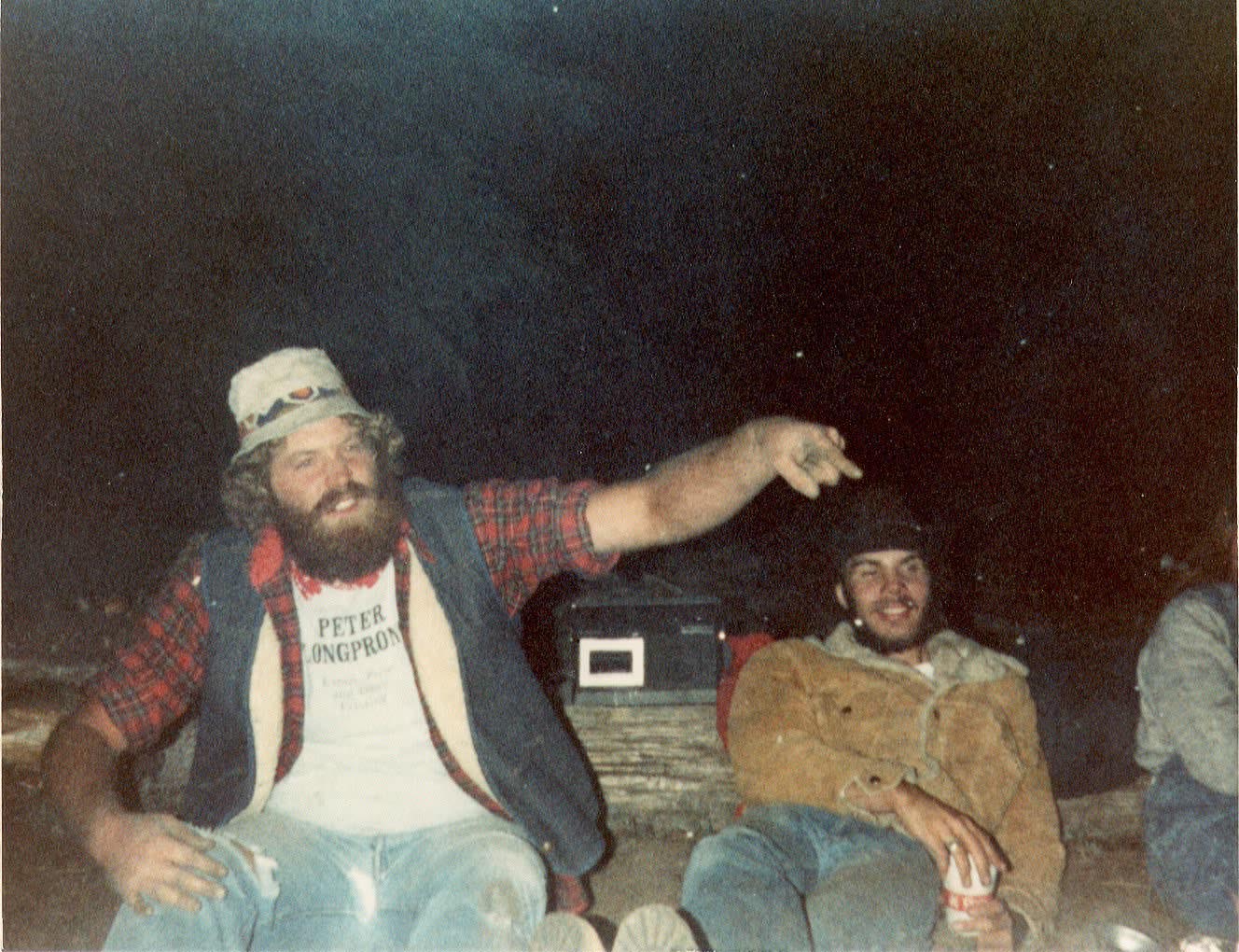 Two men at the campfire, early years