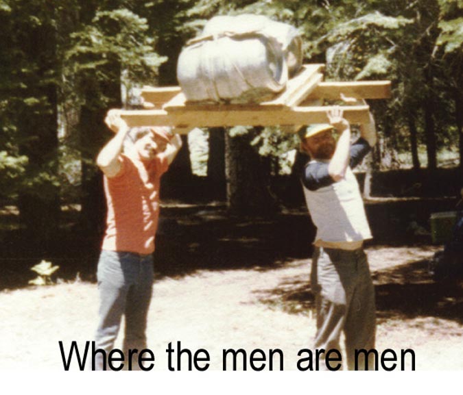 Two men hoisting the original wooden stretcher and keg overhead — early Kegger, captioned 'Where the men are men'